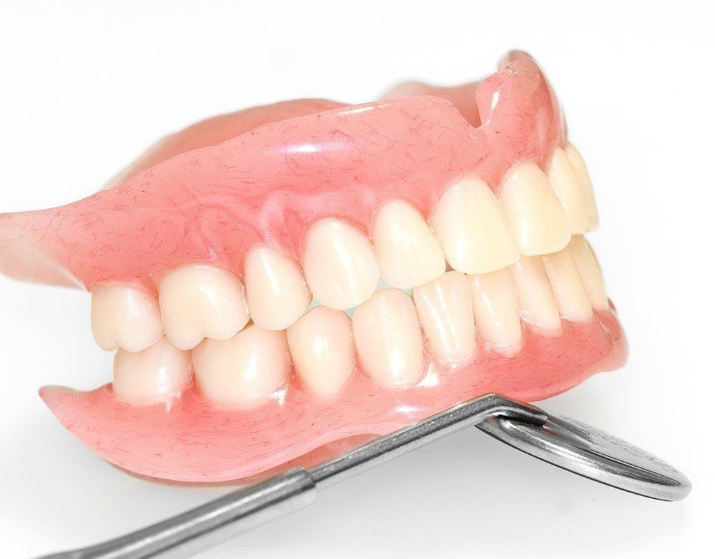 پروتز کامل (دست دندان) به جای ایمپلنت دندان